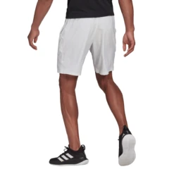 Adidas Men's Club Stretch Woven 9-Inch Shorts (White/Black) 4 Adidas Men's Club Stretch Woven 9-Inch Shorts (White/Black) -Racquet Equipment Store GH7222 APP on model back white 29f7829f 09eb 48a0 b5b7 20e53a10cb66
