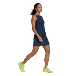 Adidas Women's Primeblue Dress (Navy/Yellow) -Racquet Equipment Store GH7599 APP on model walking white