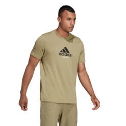 Adidas Men's Tennis Graphic Tee Top (Orbit Green) -Racquet Equipment Store GU8862 APP on model walking white