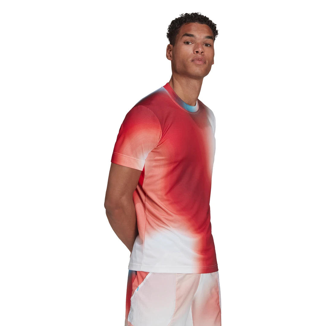 adidas Men's Melbourne FreeLift Printed Top (White/Vivid Red/Black) Adidas Men's Melbourne FreeLift Printed Top (White/Vivid Red/Black) -Racquet Equipment Store H67126 APP on model walking white